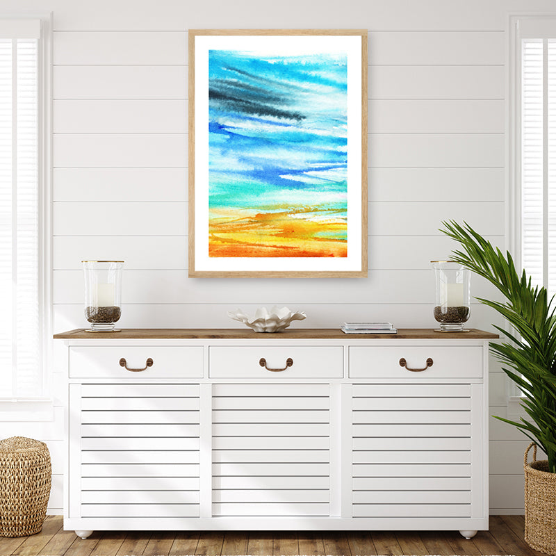 Aqua and gold abstract coastal framed art print with sweeping brushstrokes in seaside colours in a coastal interior.