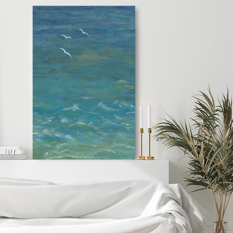 Art print depicting an aerial view of a turquoise sea with white-capped waves and seagulls soaring above.