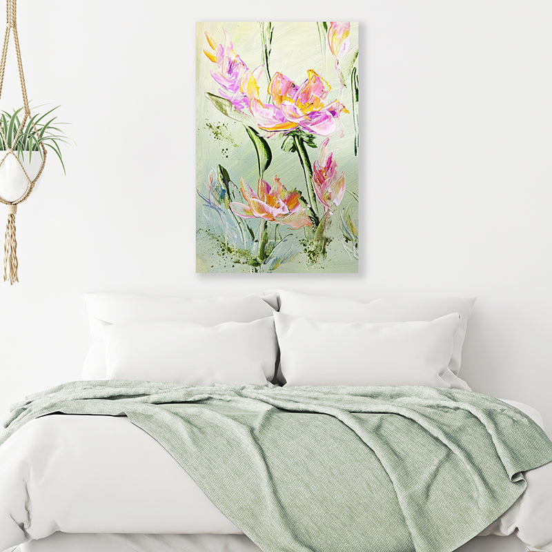 Art print of pink flowers and olive green foliage, displayed in a soft-green and white minimalist bedroom.