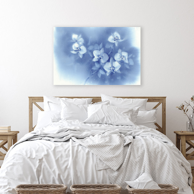 Canvas art print depicting white orchids against a dusky blue moonlit sky displayed in a farmhouse-style bedroom.