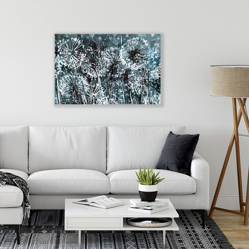 Canvas wall art print in inky black and white depicting dandelions glowing in the moonlight, in a minimalist interior.
