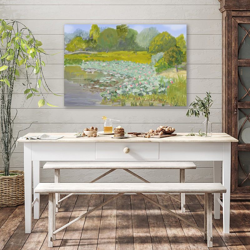 Art print capturing the lush green landscape of a country estate displayed in a rustic farmhouse-style interior.