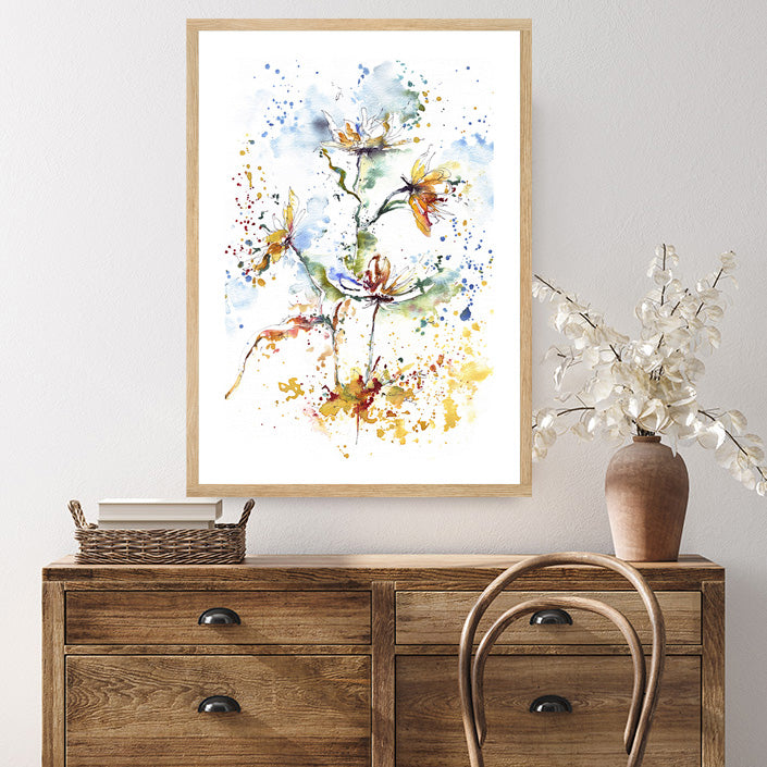 Framed art print of flowers, transformed into a warm tan tone as they dry, displayed in a country-style interior.