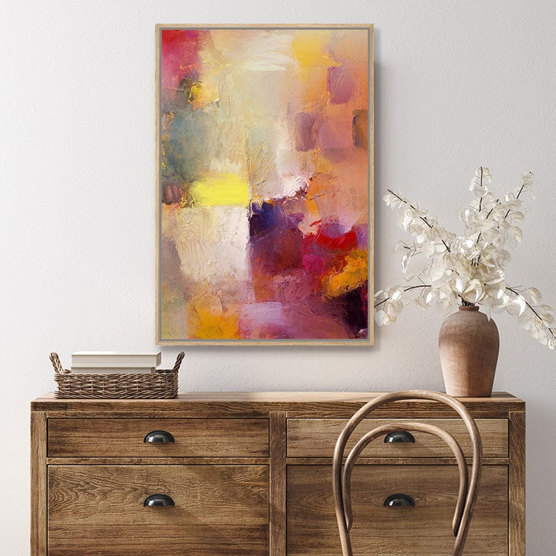 Abstract framed canvas art print in the rich jewel colours of ruby red, amethyst, and topaz in a farmhouse style interior.
