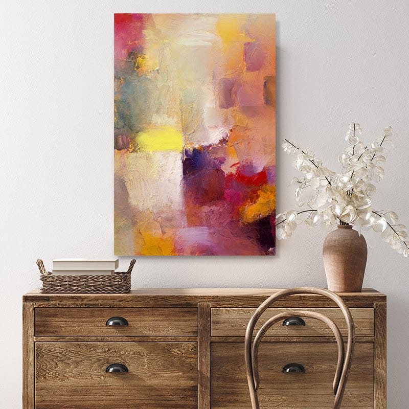 Abstract canvas art print in the rich jewel colours of ruby red, amethyst and topaz in a farmhouse style interior.