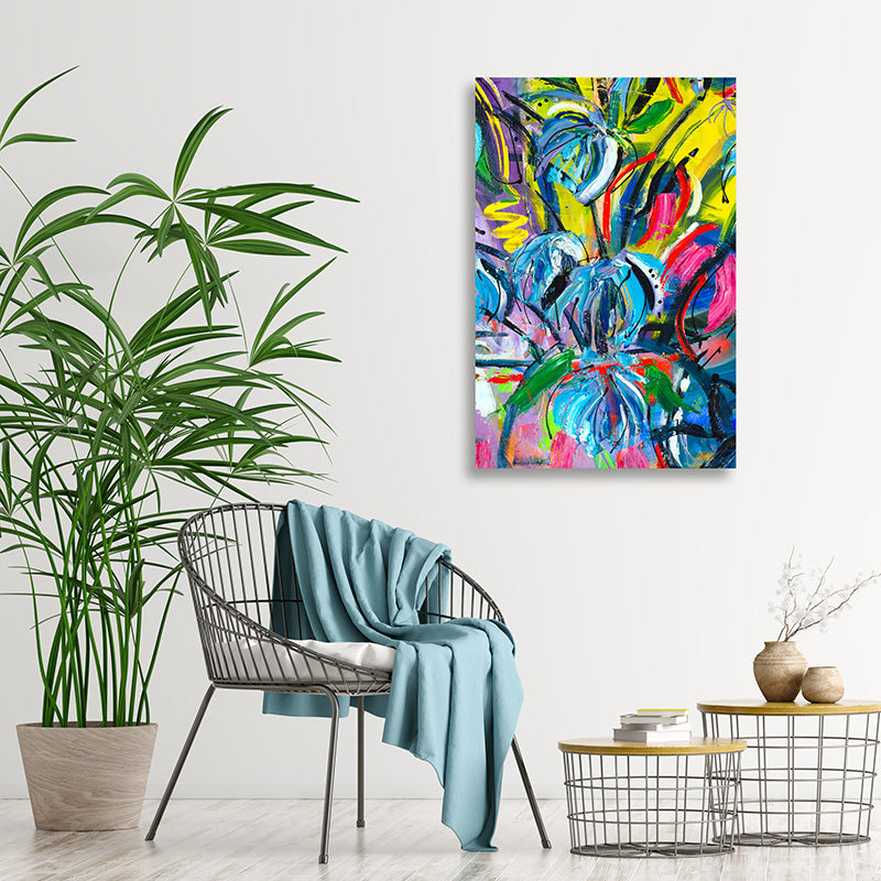 Colourful abstract art print of blue, pink, and yellow tropical flowers in modern minimalist interior.