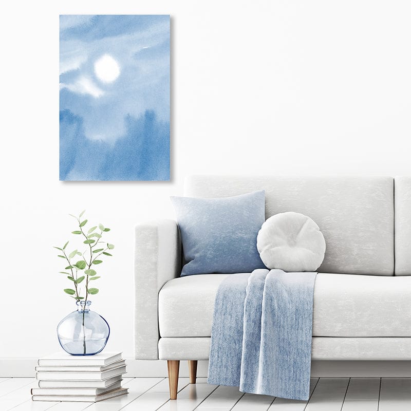 Watercolour art print of pastel blue sky with the sun breaking through the clouds in a minamilist pale grey, pastel blue, and white living room.